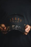 Jesus is King - Black and Darkwood Camo Snapback