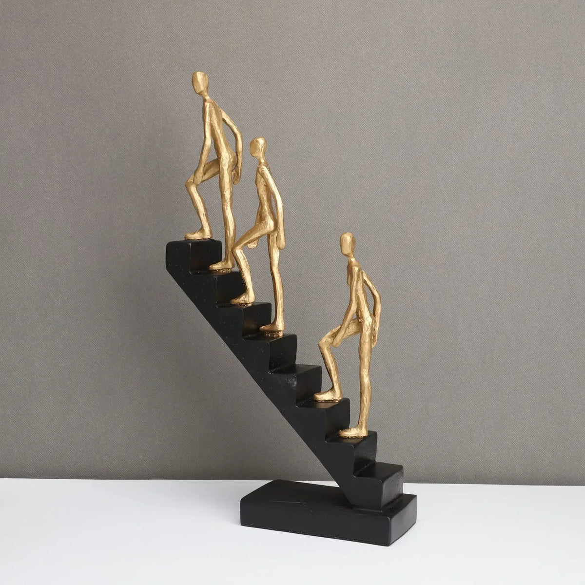 Modern Staircase Climbing Human Sculpture for Home Decor