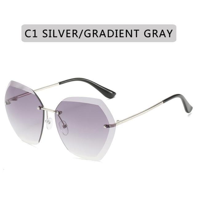 Classic Rimless Sunglasses Women Metal Frame Diamond Cutting Lens Sunglasses For Women New Fashion Black Color New Retro Sun Glasses For Women New Summer Style Sun glasses For Female Famous Style Frames