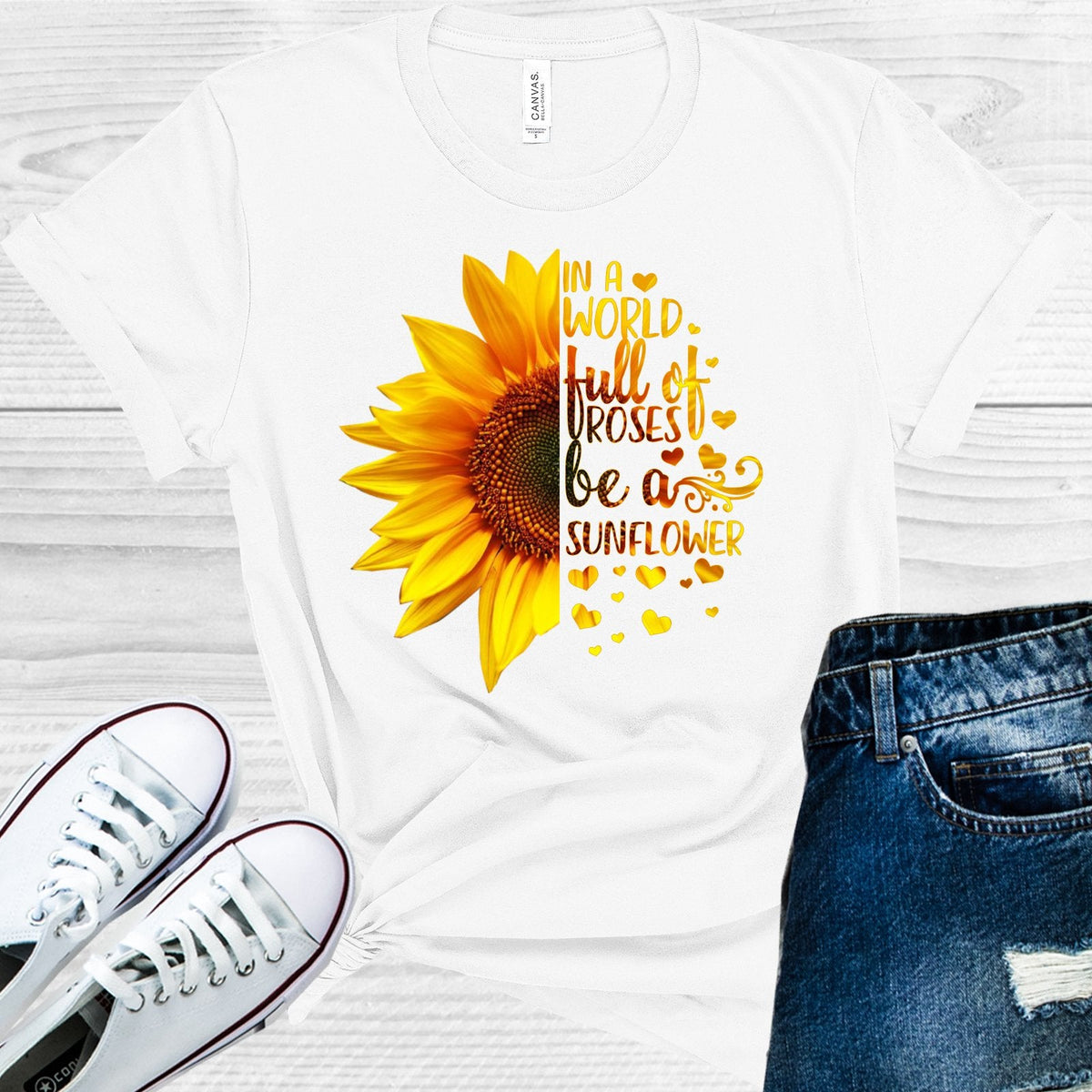 In a World Full of Roses Be a Sunflower Graphic Tee